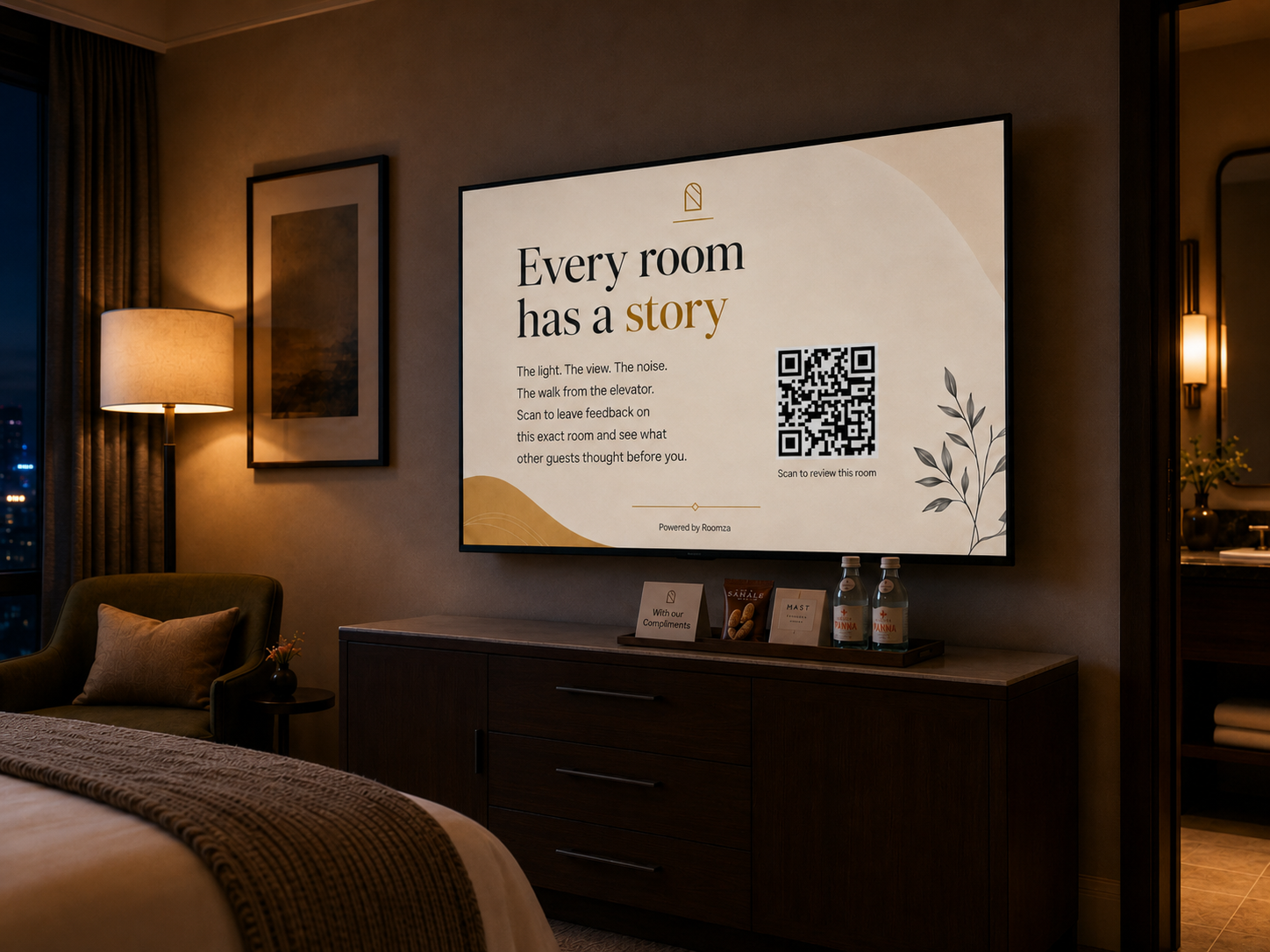Hotel-room TV displaying the 'Every room has a story' prompt with a QR code to review the room